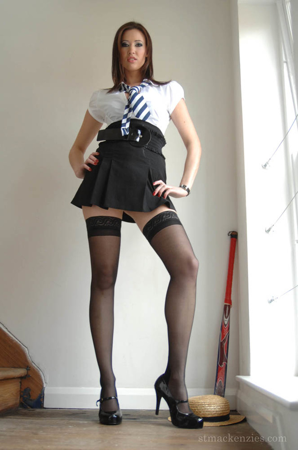 Lovely brunette strips her uniform and show - XXX Dessert - Picture 1