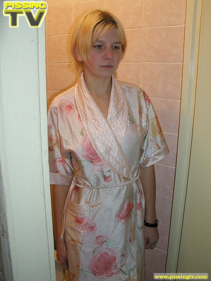 A slutty blonde bitch demonstrates how enjoyable  taking a piss in the toilet can be - XXXonXXX - Pic 1