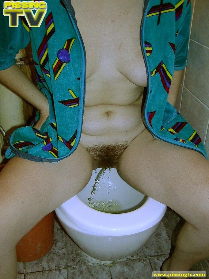 Beautiful brunette teen takes a piss in the toilet with legs spread wide and her generous gushing can be clearly viewed - XXXonXXX - Pic 7