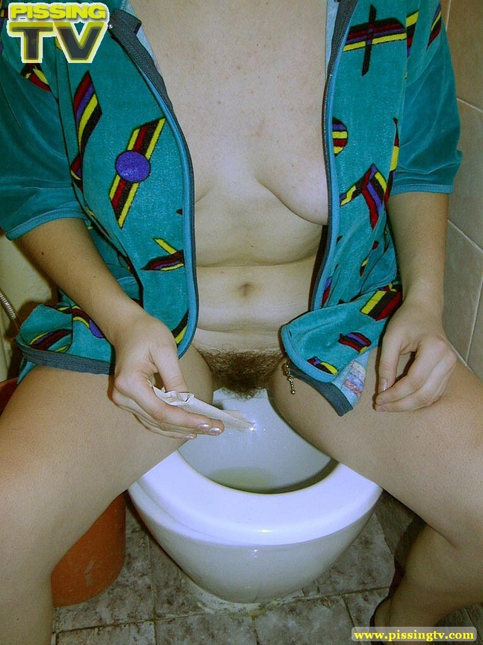 Beautiful brunette teen takes a piss in the toilet with legs spread wide and her generous gushing can be clearly viewed - XXXonXXX - Pic 14