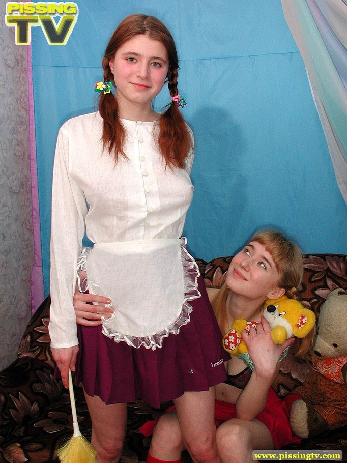 Two playful teens pose and show how cute and tight their pussies are then they take turns getting some pee on their faces and mouths - XXXonXXX - Pic 2