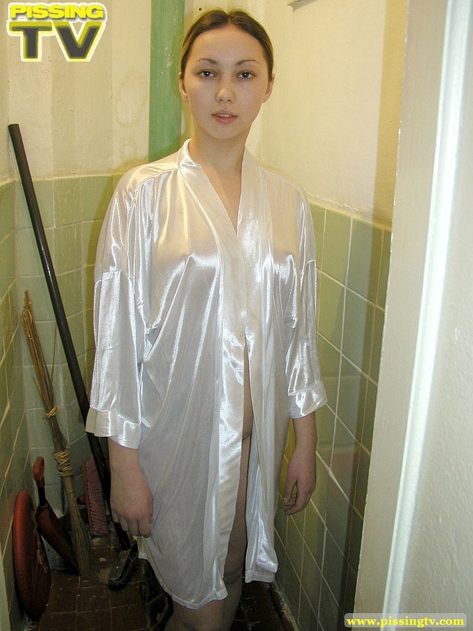 Brunette beauty wearing only a silk robe takes a wonderfully nasty piss inside a very dirty toilet by sitting on the toilet seat - XXXonXXX - Pic 4