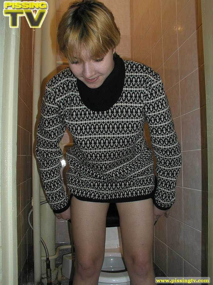 Blonde bitch sits on the toilet and enjoys some moments of wonderful piss coming from her tight sweet cunt - XXXonXXX - Pic 6
