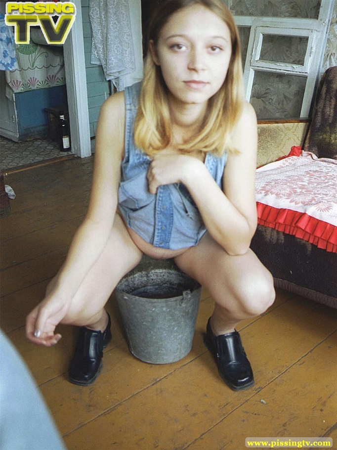Playful blonde teen bitch enjoys being able to let loose her steaming golden piss in a bucket where her piss creates so much noise as it splashes around - XXXonXXX - Pic 12