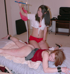 Brunette teen dropping hot wax on her friend's naked ass - XXXonXXX - Pic 2