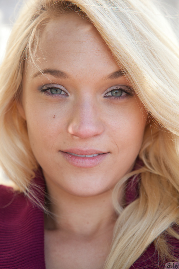 Naughty blonde girl in a striped sweater po - XXX Dessert - Picture 3