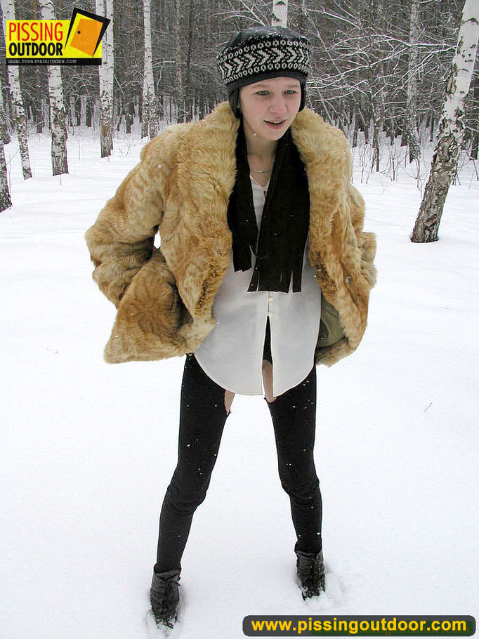 Cute white teen in fur coat, shirt and pantyhose takes an piss in the snow - XXXonXXX - Pic 2