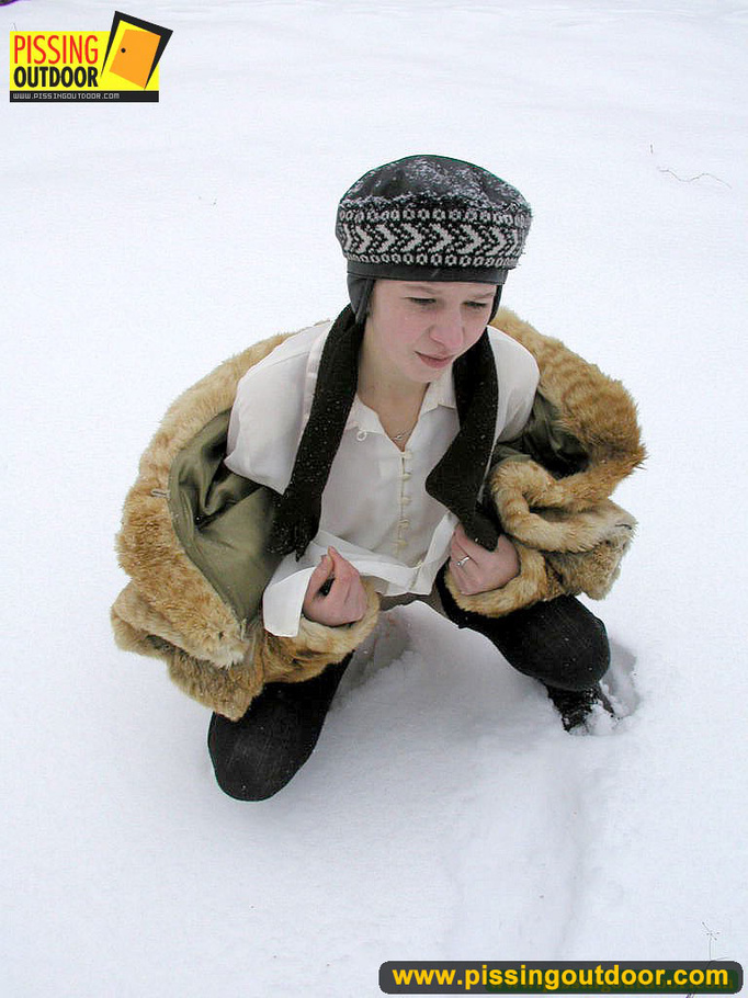 Cute white teen in fur coat, shirt and pantyhose takes an piss in the snow - XXXonXXX - Pic 14