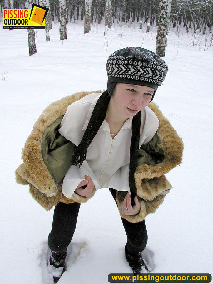 Cute white teen in fur coat, shirt and pantyhose takes an piss in the snow - XXXonXXX - Pic 15