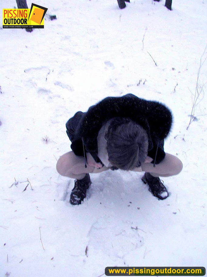 Kinky teen in glass bends to piss in the snow revealing tits and cute bushy pussy - XXXonXXX - Pic 4