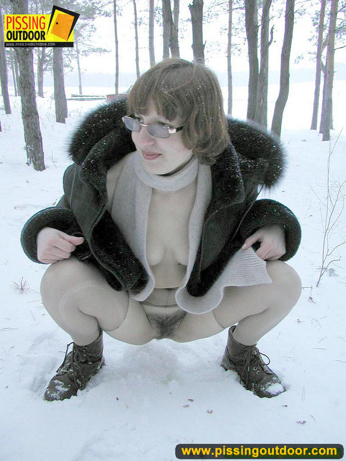 Kinky teen in glass bends to piss in the snow revealing tits and cute bushy pussy - XXXonXXX - Pic 11