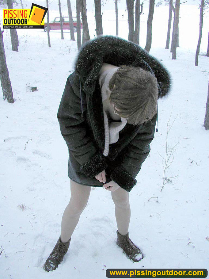 Kinky teen in glass bends to piss in the snow revealing tits and cute bushy pussy - XXXonXXX - Pic 18