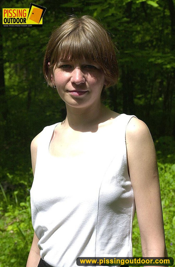 Teen with cute small tits take off her clothes to stand and piss in the woods - XXXonXXX - Pic 1