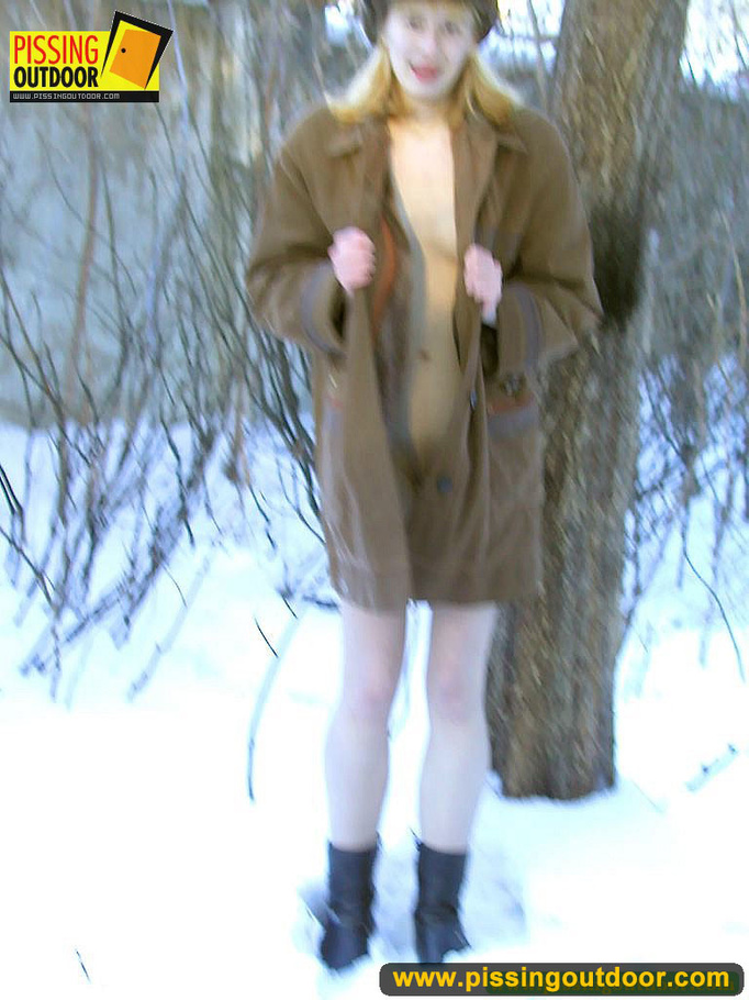Blonde teen wearing only a coat in winter opens it to stand pissing on the snow - XXXonXXX - Pic 8