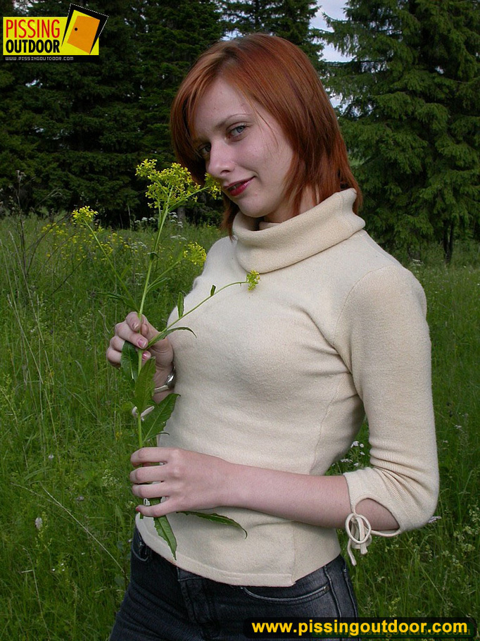 Redhead chick having a picnic in the woods goes nude to piss outdoors - XXXonXXX - Pic 1