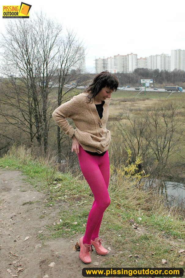 Brunette has no problem exposing her tush outdoors to take a piss in nature - XXXonXXX - Pic 1