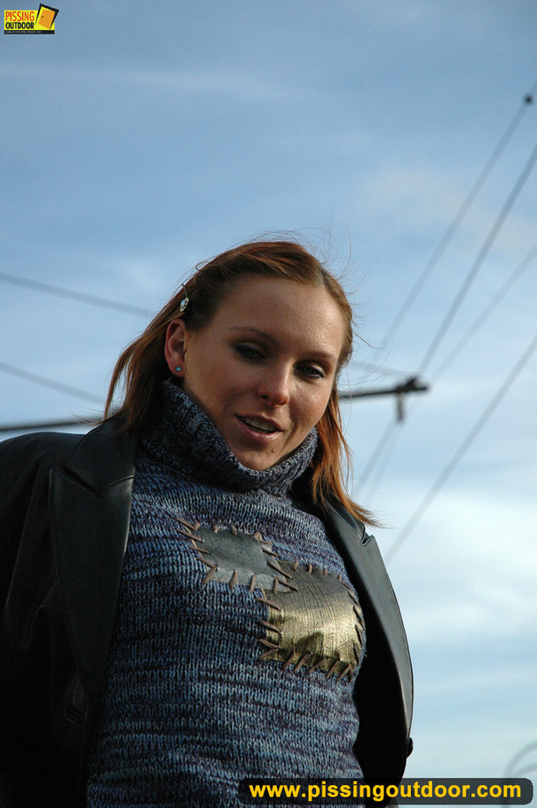 City babe cant wait to get home and bends down to piss right on the city streets - XXXonXXX - Pic 14