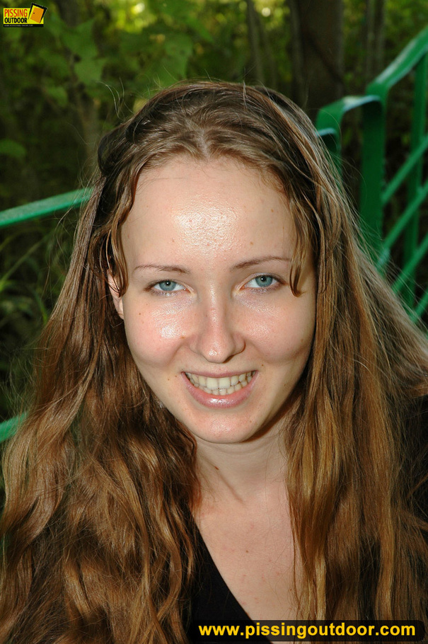 Smiling cute shapely chick in sexy black dress pisses along the park steps - XXXonXXX - Pic 18