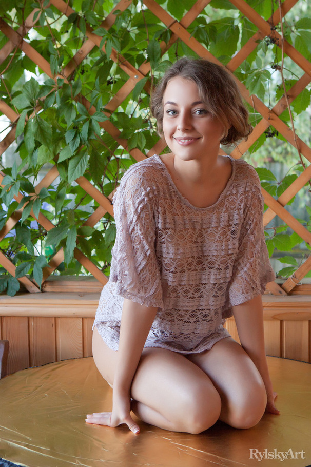 Bodacious teen girl undresses in the garden - XXX Dessert - Picture 1