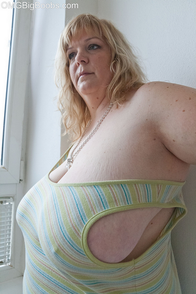 Slutty blonde bbw teasing you with her milky titties - Picture 8