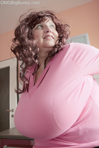 Lewd bbw in a pink pullover flaunting her massive juggs - Picture 6