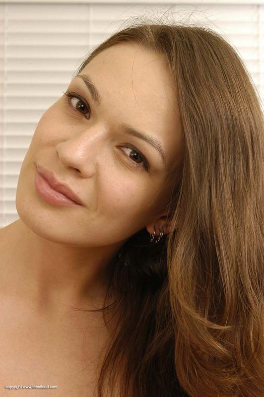 Lustful brunette teen babe satisfying herself on the bed - XXXonXXX - Pic 1