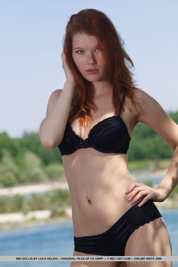 Young redhead takes off her bikini on the s - XXX Dessert - Picture 1
