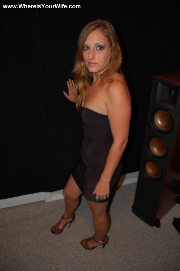 Blonde MILF in a black dress exposing her a - XXX Dessert - Picture 1