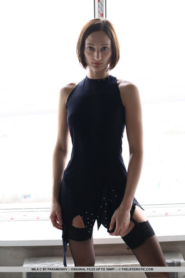 Short-haired beauty in a black dress and st - XXX Dessert - Picture 1
