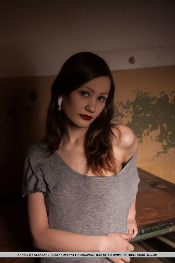 Slender teen in a grey dress takes it off a - XXX Dessert - Picture 1