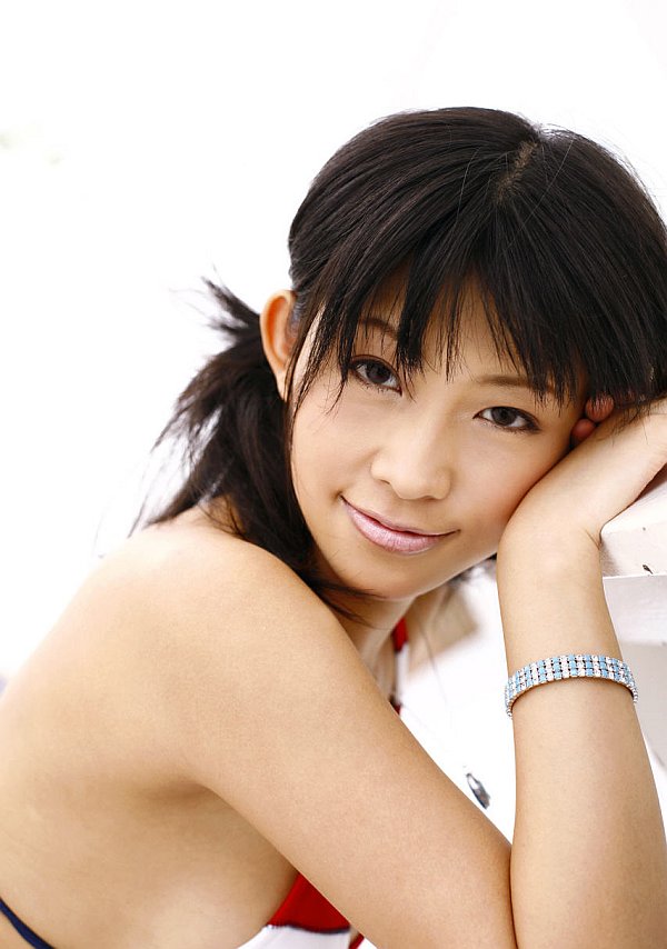 Saucy shiela posing in her striped swimsuits and some topless shots. - XXXonXXX - Pic 1