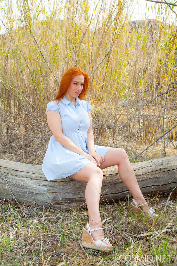 Redhead in the woods unbuttons dress, remov - XXX Dessert - Picture 1