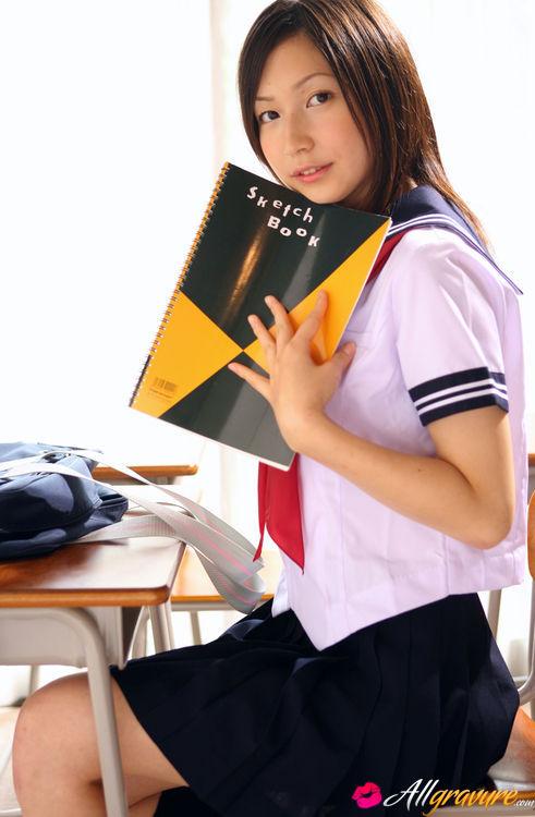 Betty in a blue skirt and white blouse poses in a classroom. - XXXonXXX - Pic 2