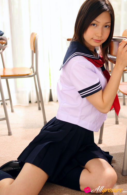 Betty in a blue skirt and white blouse poses in a classroom. - XXXonXXX - Pic 8
