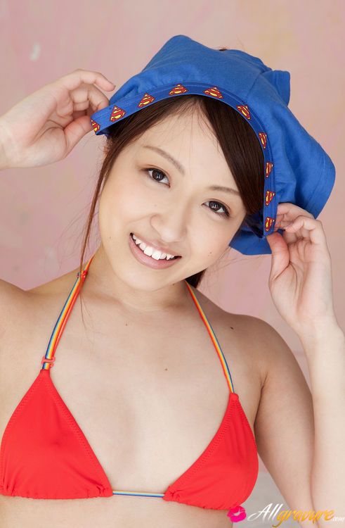 Nympho in a red bikini posing on a colorful sunbed. - XXXonXXX - Pic 5