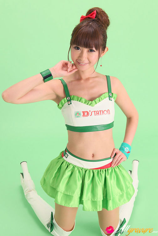Bird in a green skirt and white boots posing in front of a green background. - XXXonXXX - Pic 6