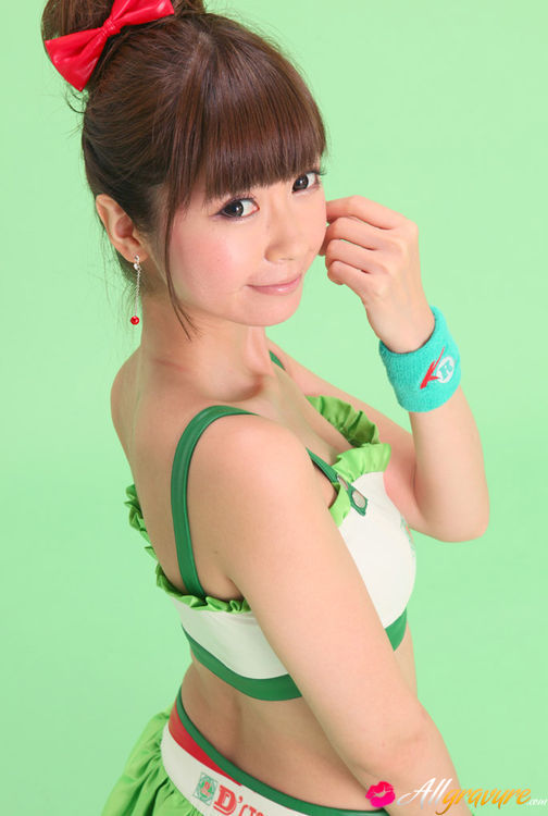 Bird in a green skirt and white boots posing in front of a green background. - XXXonXXX - Pic 14