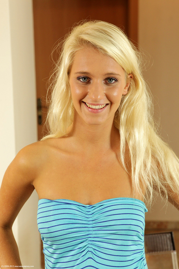 Tender betty in a striped dress does a glass toy on a glass chair. - XXXonXXX - Pic 1