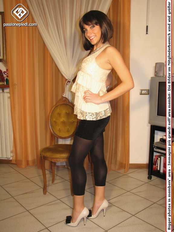 Cute teeny in a beige blouse and leggings takes off her shoes to flaunt her toes - XXXonXXX - Pic 1