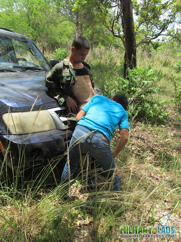 Male in camo gear gets his cock sucked in front of a car. - XXXonXXX - Pic 3