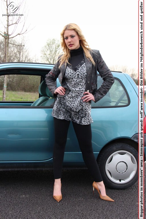 Vamp gets out of her tan heels and gets in the car. - XXXonXXX - Pic 1