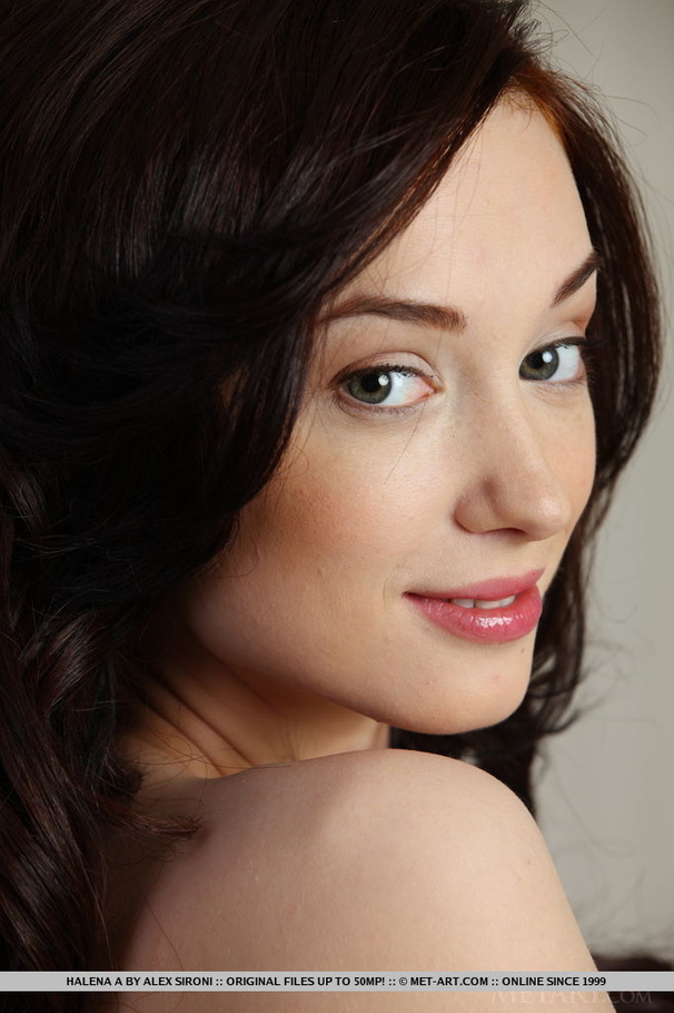 Sumptuous hussy in a white floral dress shows off her shaved quim on an orange sofa. - XXXonXXX - Pic 1