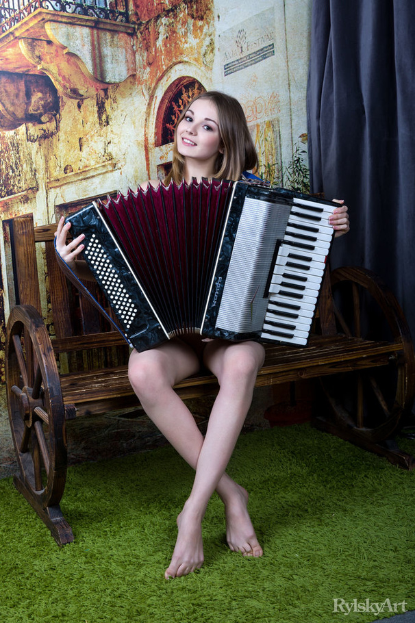 Young nude blonde plays music and models su - XXX Dessert - Picture 1