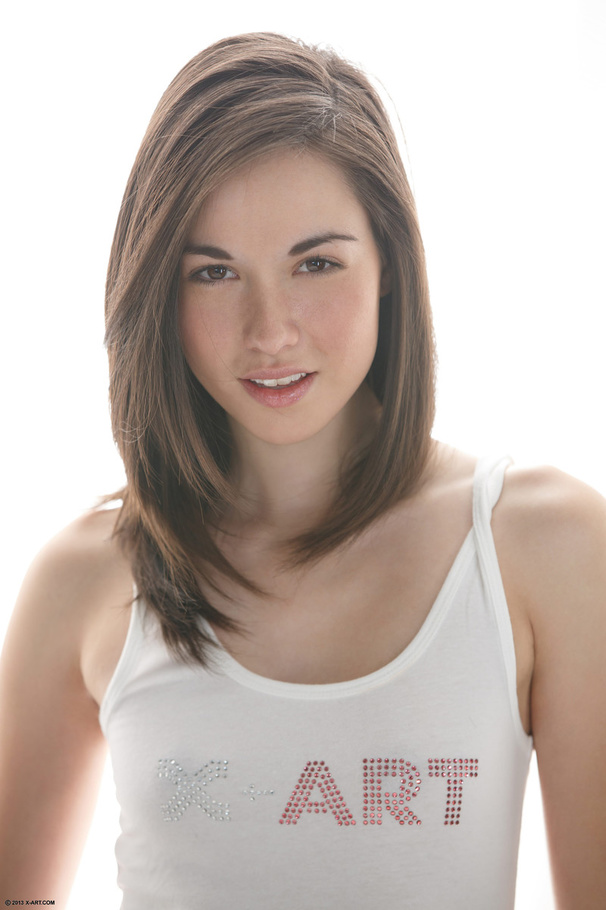 Cute brunette teen in a white vest drilling - XXX Dessert - Picture 1