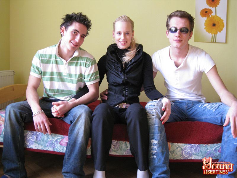 Thin blonde with tiny nips stripped to red bra and panties by two studs before raunchy threesome. - XXXonXXX - Pic 1