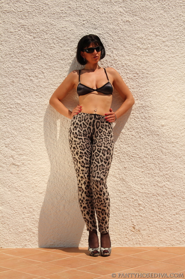 Brunette pulls cheetah print leggings off b - XXX Dessert - Picture 1