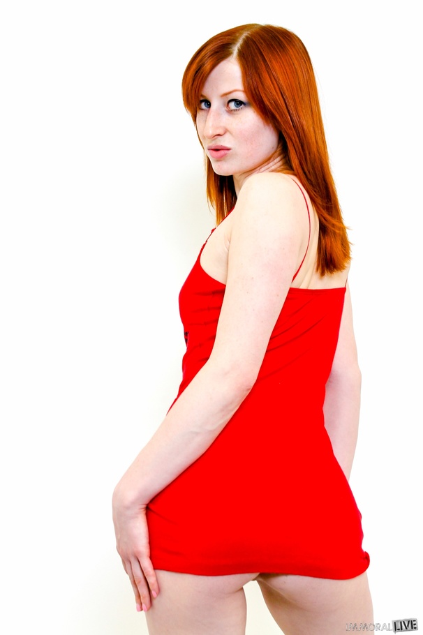 A red dress and red hair stand out on a fai - XXX Dessert - Picture 4