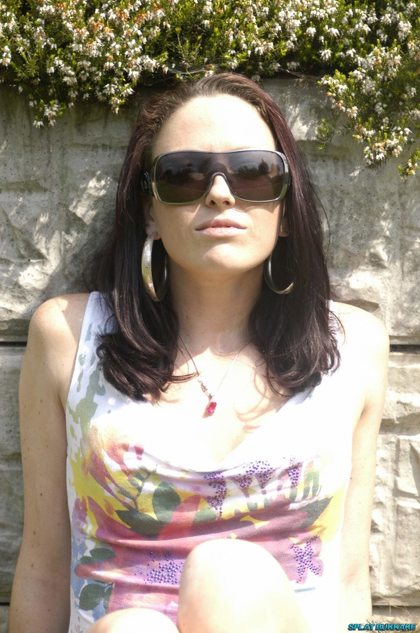 Gorgeous brunette with sunglasses displays her sexy body wearing her white floral shirt and mini jeans shorts outdoor before she goes inside and kneels down then lets a bunch of cocks slap her face before she sucks them and gets a warm facial. - XXXonXXX - Pic 3