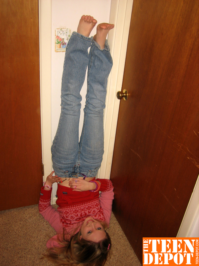 Cute teen hottie takes off her pink and red sweater and blue jeans then bares her skinny body and hot ass before she removes her pink and white thong and rubs her pussy in different positions by a door. - XXXonXXX - Pic 1