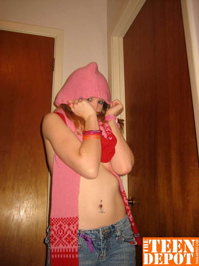 Cute teen hottie takes off her pink and red sweater and blue jeans then bares her skinny body and hot ass before she removes her pink and white thong and rubs her pussy in different positions by a door. - XXXonXXX - Pic 7